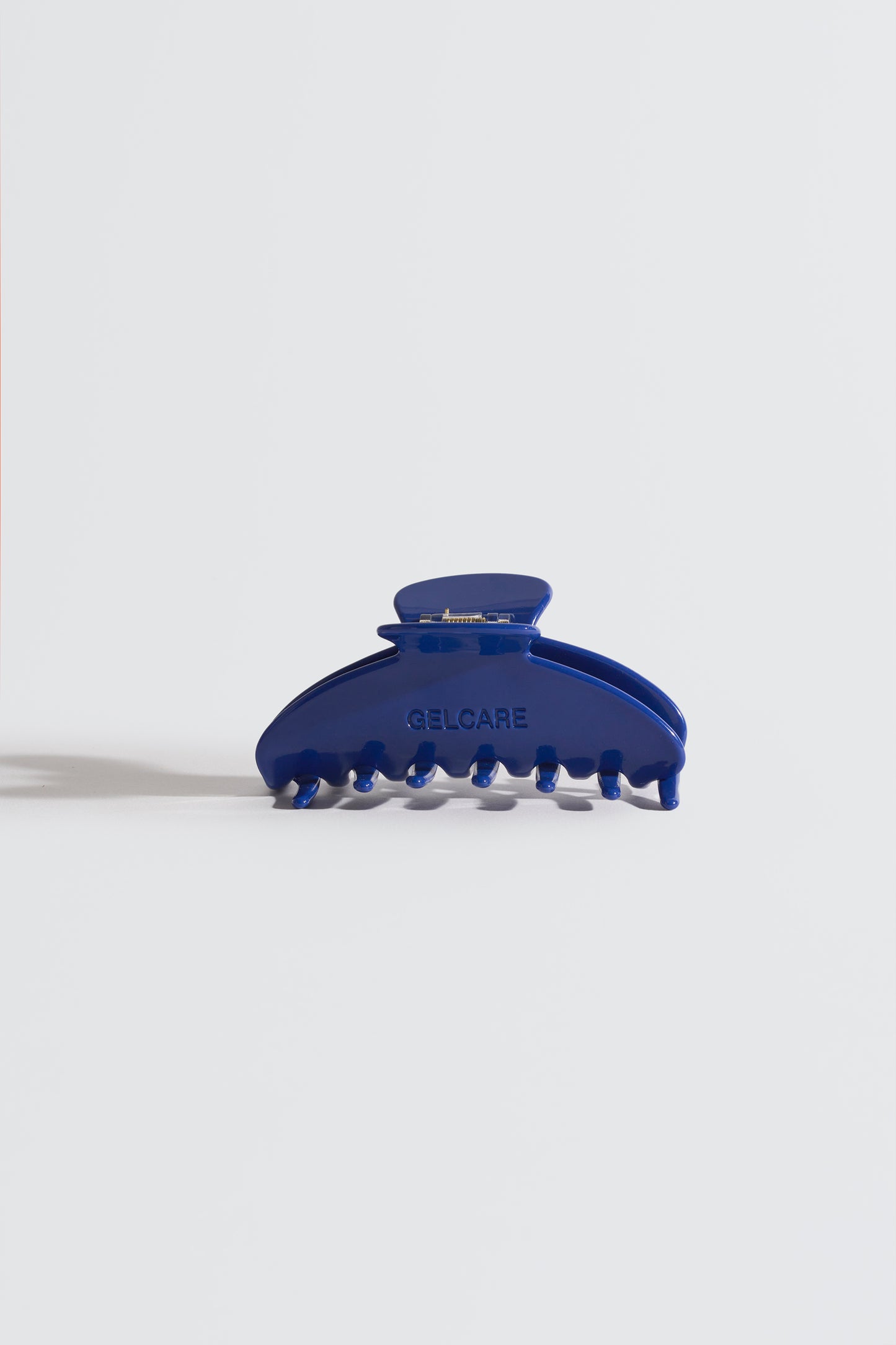 pince à cheveux gelcare bleu foncé