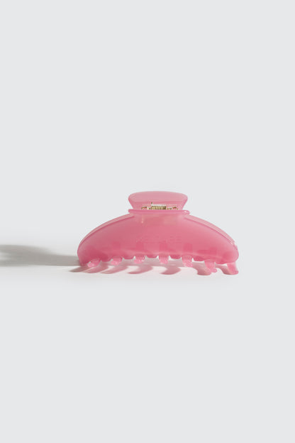 pince pour les cheveux de couleur rose