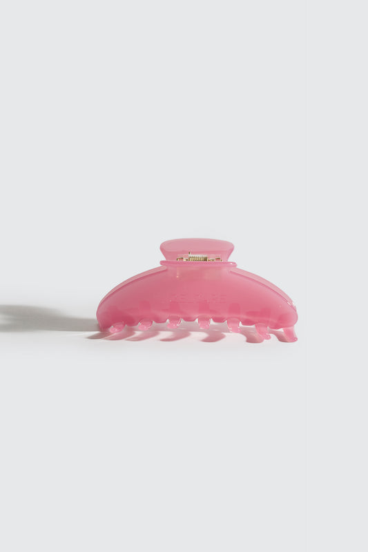 pince pour les cheveux de couleur rose